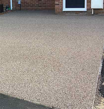 Residential driveway using resin bonded